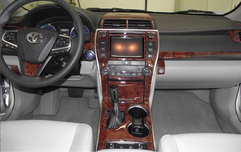 The Wood dash kit enhances the interior of a Toyota Avalon.
