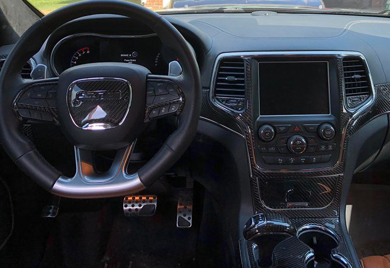 The car's interior can be enhanced with a Fits Jeep Grand Cherokee 2014 2015 2016 2017 Basic Dash Trim Kit, also known as an Interior Dash Trim Kit or Car Dash Kit.
