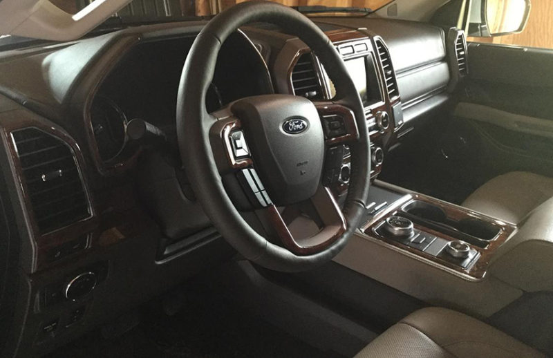 The interior of a Fits Ford Expedition 2018-Up pickup truck fitted with an interior dash trim kit and accessories for cars.